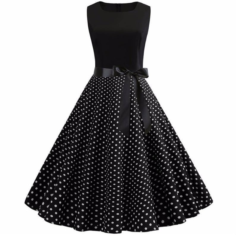 Schwarzes Vintage-Kleid mit weißen Punkten zum günstigen Preis
