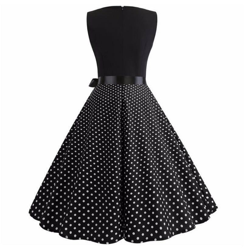 Schwarzes Vintage-Kleid mit weißen Punkten zum günstigen Preis