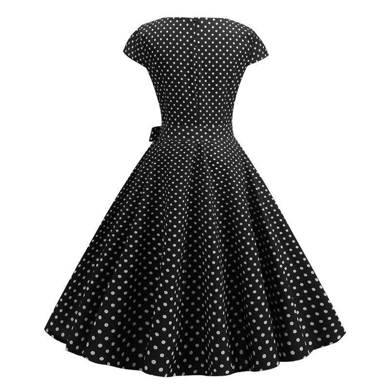 Schwarzes Vintage-Kleid mit kleinen weißen Polka Dots