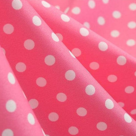 Vintage rosa Kleid mit kleinen weißen Polka Dots
