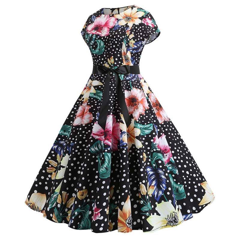 Vintage-Kleid mit kleinen Tupfen und bunten Blumen