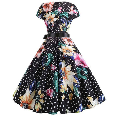 Vintage-Kleid mit kleinen Tupfen und bunten Blumen