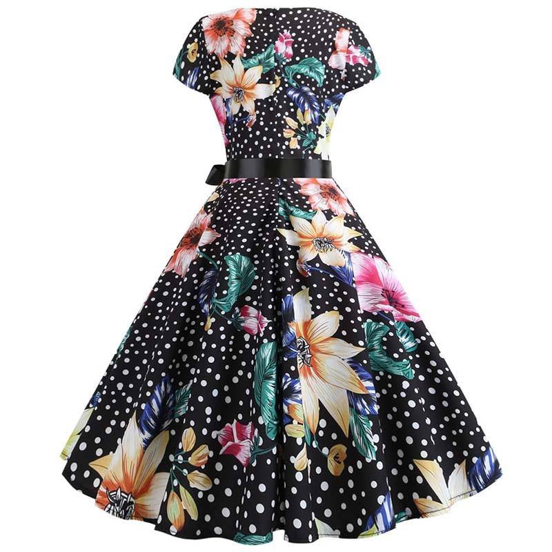 Vintage-Kleid mit kleinen Tupfen und bunten Blumen