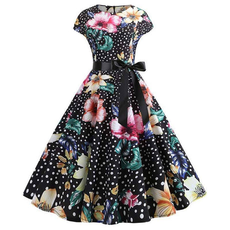 Vintage-Kleid mit kleinen Tupfen und bunten Blumen