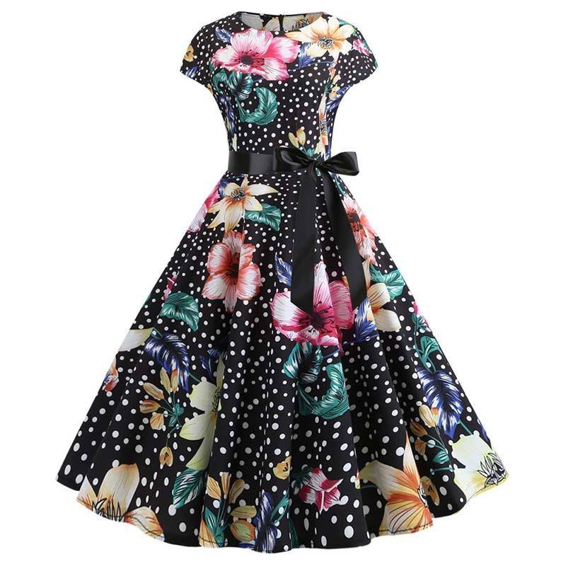 Vintage-Kleid mit kleinen Tupfen und bunten Blumen