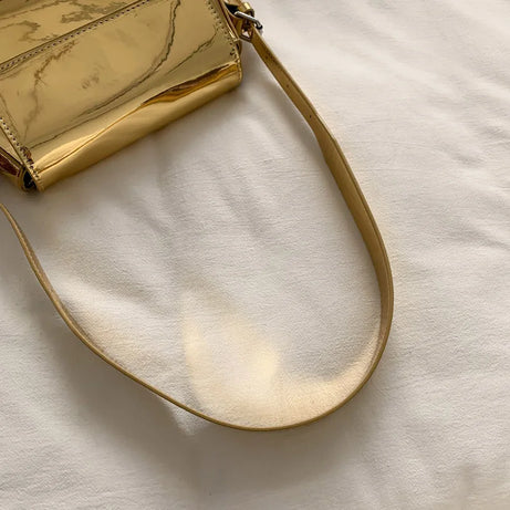 Sac à main doré bandoulière