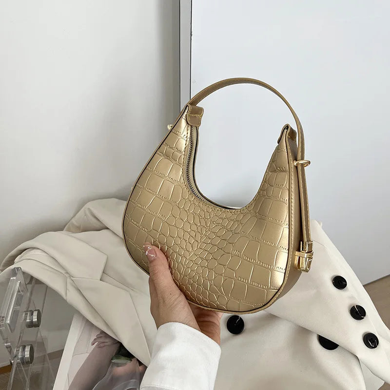 Sac à main doré hobo