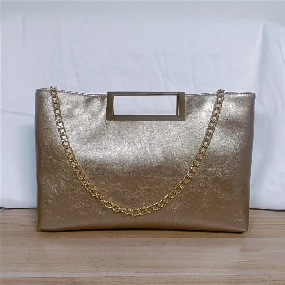 Sac à main doré pochette