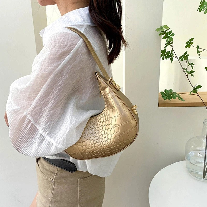 Sac à main doré hobo