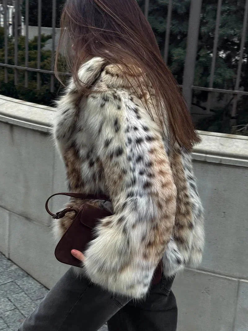 Manteau femme imprimé léopard en fausse fourrure
