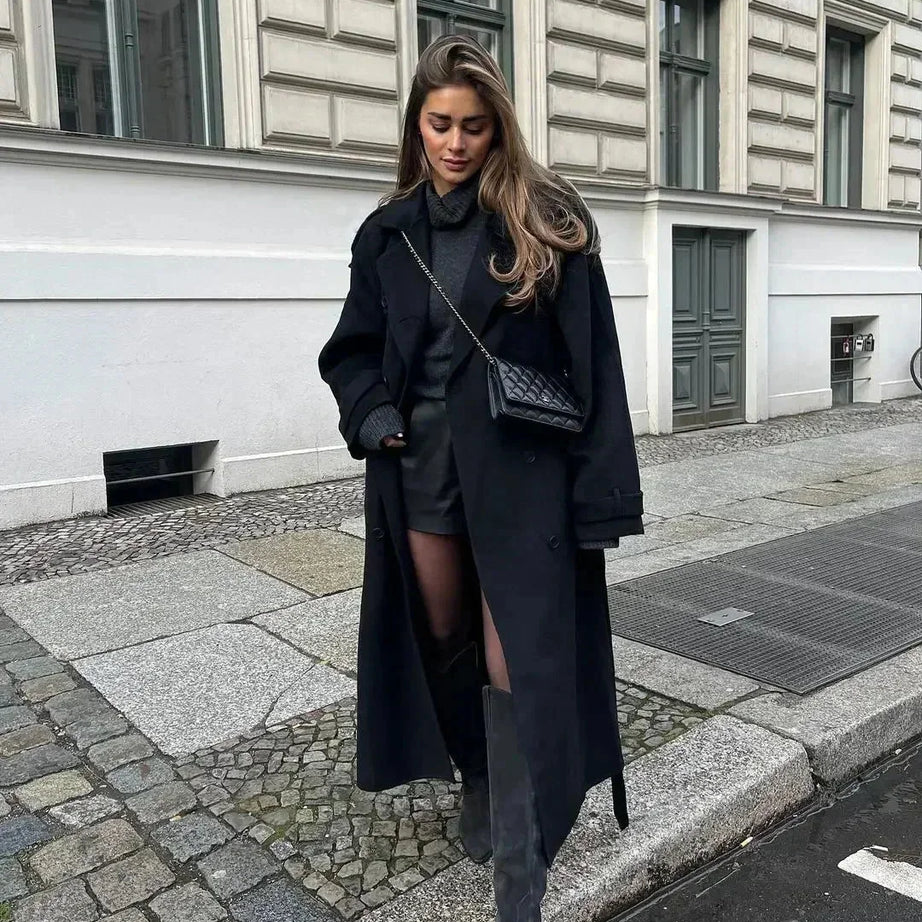 Manteau long noir femme avec ceinture et larges revers