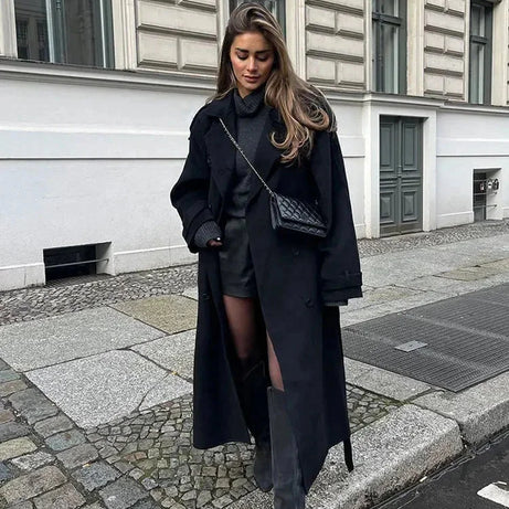 Manteau long noir femme avec ceinture et larges revers