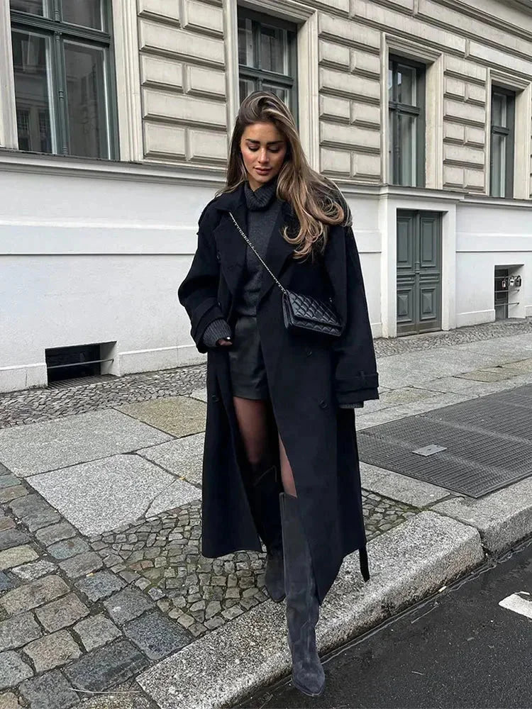 Manteau long noir femme avec ceinture et larges revers
