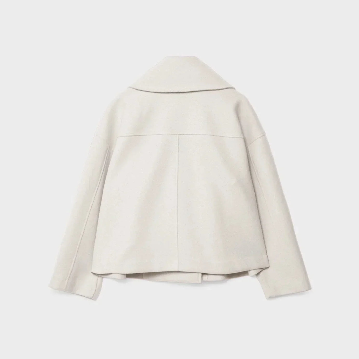 Veste femme courte à double boutonnage moderne