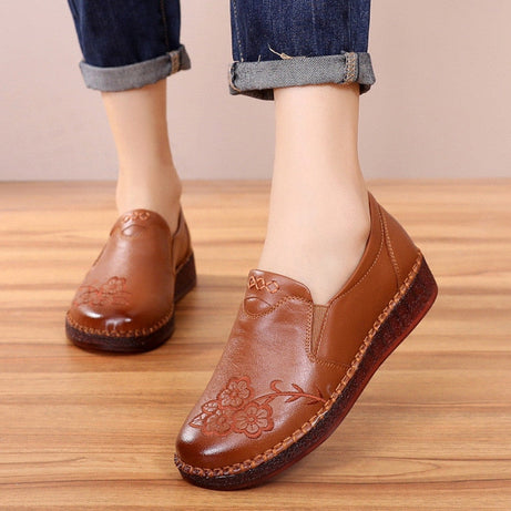 Flache Sneakers aus Tang-Leder